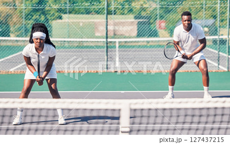Tennis, teamwork and portrait of black couple on court for match, game or competition. Exercise, fitness and doubles partners, tennis players and man and woman training for sports practice outdoors. 127437215