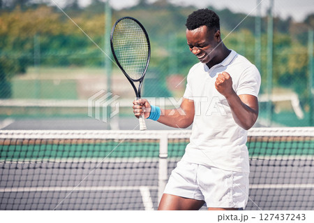 Tennis, sport and black man celebrate win, success and yes to winning game, happy athlete and fitness outdoor. Player on tennis court, winning and celebration with exercise and sports training. 127437243