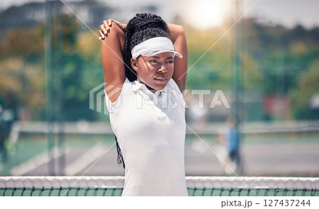Fitness, tennis and stretching woman with focus, motivation and exercise wellness for sports competition, event or training. Black woman athlete in tennis court warm up workout for performance energy Fitness, tennis and stretching woman with focus, motivation and exercise wellness for sports competition, event or training. Black woman athlete in tennis court warm up workout for performance energy 127437244