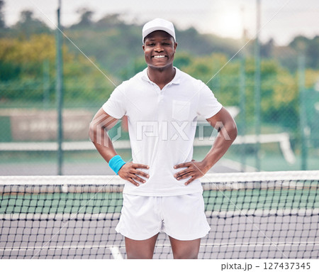 Fitness, tennis and portrait of a black man on the court ready for outdoor training or a match. Sports, tournament and young African athlete standing on a tennis court for a game, workout or exercise Fitness, tennis and portrait of a black man on the court ready for outdoor training or a match. Sports, tournament and young African athlete standing on a tennis court for a game, workout or exercise 127437345