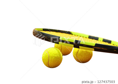 Three yellow balls under a racket, isolated on white 127437503