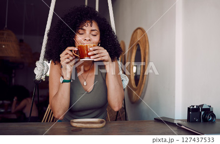 Black woman, coffee or tea to relax at a cafe for thinking, motivation and morning inspiration at a table of restaurant. Female customer smelling aroma of brazil roast or caffeine at coffee shop 127437533