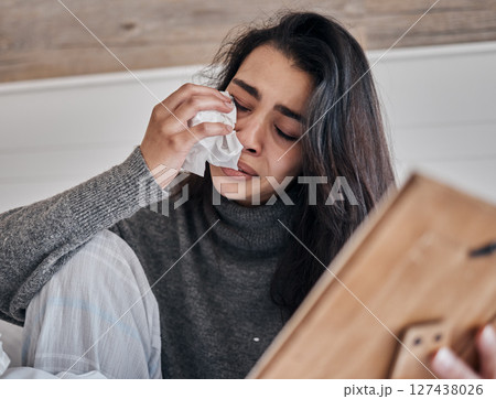 Crying, frame and woman with tissue, sad and upset for difficult loss. Mental health, young female or girl with tears for depression, grief and frustrated after breakup Crying, frame and woman with tissue, sad and upset for difficult loss. Mental health, young female or girl with tears for depression, grief and frustrated after breakup 127438026