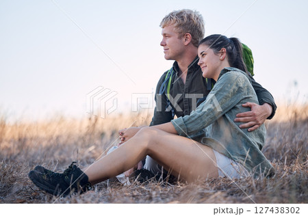 Couple, relax and hug in nature for travel adventure or vacation freedom on grass. Friends, peace and zen happiness outdoor for happy zen lifestyle motivation together after mountain hike in summer 127438302