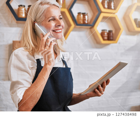Phone call, tablet and honey with a retail woman recording an online order via mobile communication. Business, ecommerce and nectar sales with a female employee talking while working in her store Phone call, tablet and honey with a retail woman recording an online order via mobile communication. Business, ecommerce and nectar sales with a female employee talking while working in her store 127438498
