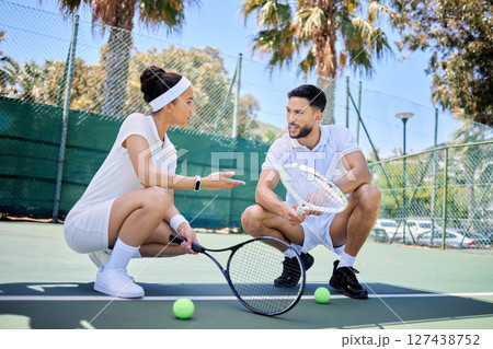 Sports, fitness and tennis team talking, speaking and planning game plan, winning strategy or teamwork discussion. Collaboration, communication and athlete tennis player on court for fitness exercise 127438752