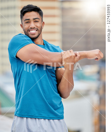 Fitness, exercise and stretching with a sports man doing a warm up before a workout or training routine. Portrait, health and stretch with a male athlete getting ready for a cardio run outdoor 127438993