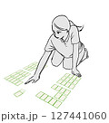 競技かるたで札を払う女性のイラスト素材 127441060