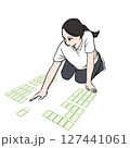 競技かるたで札を払う女性のイラスト素材 127441061