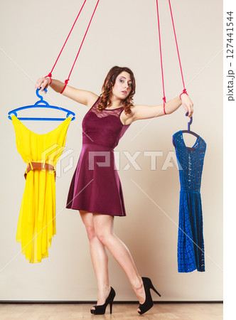 Addicted to shopping woman girl marionette with clothes 127441544