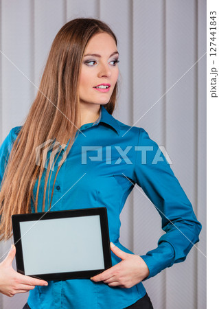 Young office worker hold tablet PC. Young office worker hold tablet PC. 127441843