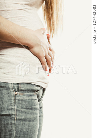 Human suffering from stomachache pain. Period. Human suffering from stomachache pain. Period. 127442083