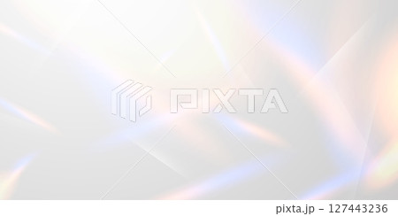 Light effect and zigzag ribbon falling from above on a beam of light, tinsel vector 127443236