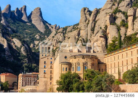 View of the famous Santa Maria de Montserrat Abbey located on the mountain of Montserrat nearby from Barcelona in Catalonia, Spain. Montserrat Monastery View of the famous Santa Maria de Montserrat Abbey located on the mountain of Montserrat nearby from Barcelona in Catalonia, Spain. Montserrat Monastery 127445666