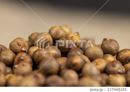 fried but not boiled chickpeas are on the table with a tablecloth, closeup fried but not boiled chickpeas are on the table with a tablecloth, closeup 127448285