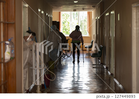 Hospital corridor with patients and doctors.Hospital interior Hospital corridor with patients and doctors.Hospital interior 127449893