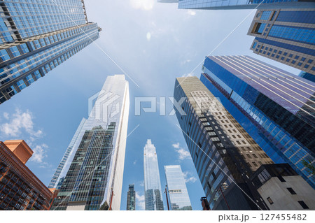 Vibrant sunny view of Chicago downtown skyline under a blue sky Vibrant sunny view of Chicago downtown skyline under a blue sky 127455482