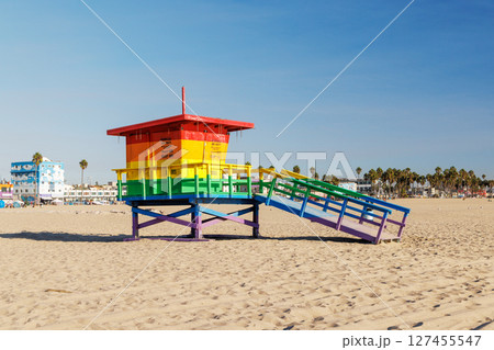 Vibrant lifeguard tower painted in LGBTQ rainbow colors 127455547