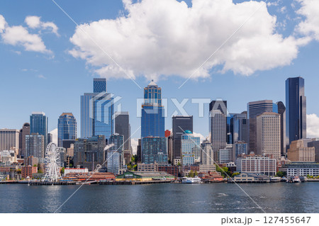 Bright and sunny panoramic view of Seattle skyline from the water Bright and sunny panoramic view of Seattle skyline from the water 127455647