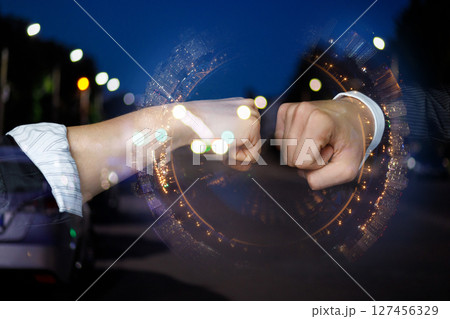 Business collaboration moment at night. 127456329