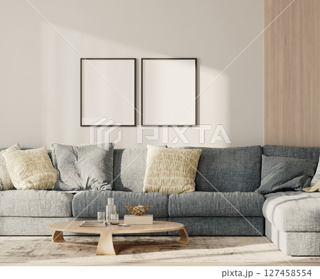 Two blank frames in lounge interior with blue sofa and table with wooden panel on the wall, 3d render 127458554