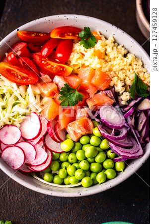 Balanced healthy bowl with vegetables and salmon Balanced healthy bowl with vegetables and salmon 127459128