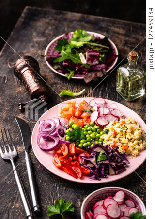 Balanced healthy bowl with vegetables and salmon Balanced healthy bowl with vegetables and salmon 127459134