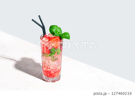 Strawberry and basil Mojito cocktail drink 127460219