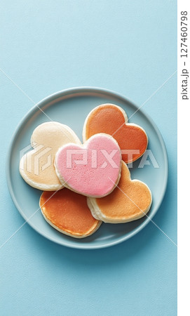 Heart-shaped Pancakes on a Plate With Pastel Colors for a Delightful Breakfast Treat 127460798