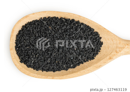 Nigella sativa or Black cumin in wooden spoon isolated on white background. Top view. Flat lay. 127463119