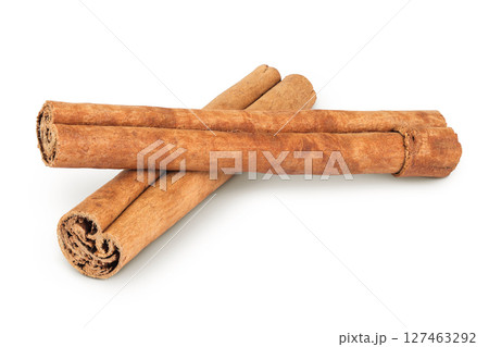 Cinnamon sticks isolated on white background with full depth of field 127463292
