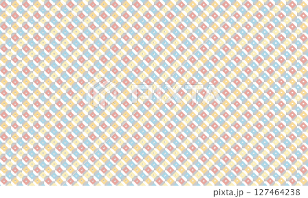 レトロな黄色と青と赤の鹿の子模様がランダムに並ぶ背景素材 127464238