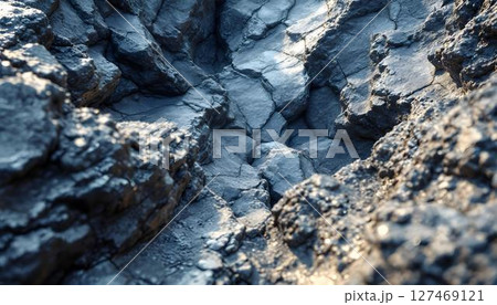 Close-up of a textured rock wall featuring prominent cracks and natural imperfections Close-up of a textured rock wall featuring prominent cracks and natural imperfections 127469121
