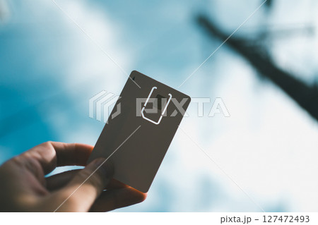 SIMカード台紙と電柱 SIMカード台紙と電柱 127472493