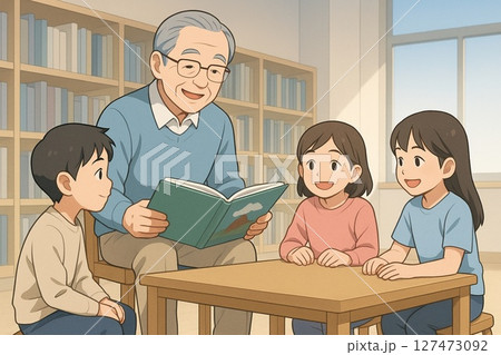 子どもに読み聞かせする高齢者 127473092