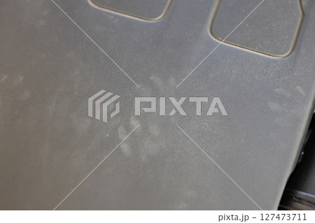Rat footprint in the car engine 127473711