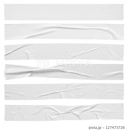 White adhesive paper tape set isolated on white background White adhesive paper tape set isolated on white background 127473726