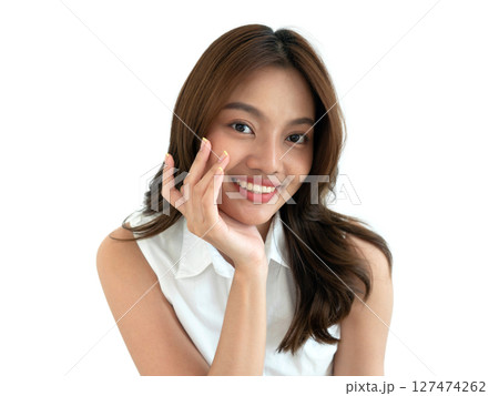 Beautiful young asian woman with clean fresh skin touch her own face . Facial treatment. Cosmetology, beauty and spa. Face care 127474262