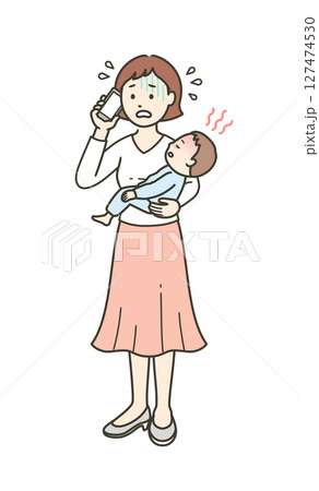 急な発熱をした子供を抱いて焦り医療機関に電話する母親 127474530