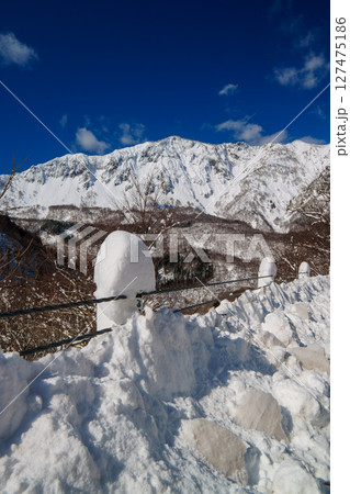 250317秋山郷の雪景色（快晴） 127475186