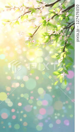 Bright spring leaves and blossoms with a dreamy bokeh background 127476850