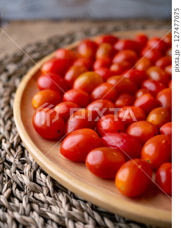 Organic Red grape cherry tomato. fresh vegetables. copy space. 127477075
