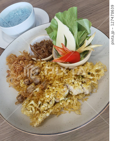 Savory and sweet complements of Khao Chae set, Thai rice soaked in cool water Savory and sweet complements of Khao Chae set, Thai rice soaked in cool water 127478639