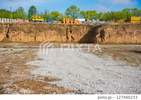 Cleared construction site prepared for building foundation. Excavation area ready for new architectural development and structural work 127480233