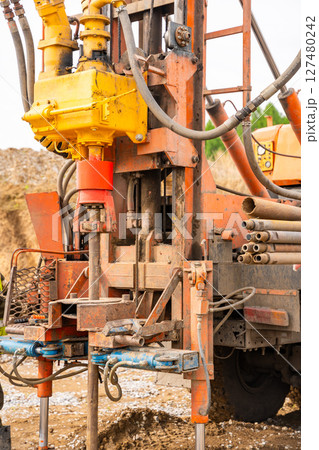 Drilling rig for pile installation and soil sampling. Heavy geotechnical equipment used for subsurface investigation and foundation works 127480242