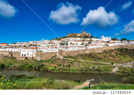 View of the river Guadiana and the village of Mertola. Alentejo Region. Portugal View of the river Guadiana and the village of Mertola. Alentejo Region. Portugal 127480834