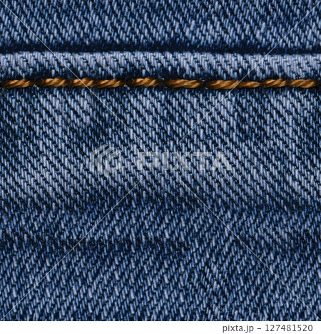 Seamless Denim fabric with yellow thread seams, denim jacket, denim pants, for background or fabric sample sale. Seamless Denim fabric with yellow thread seams, denim jacket, denim pants, for background or fabric sample sale. 127481520