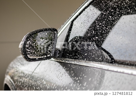 car cleaning and washing with foam soap car cleaning and washing with foam soap 127481812