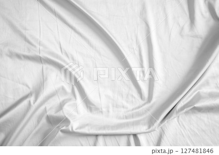 Abstract white wrinkled bedding sheet fabric texture background 127481846