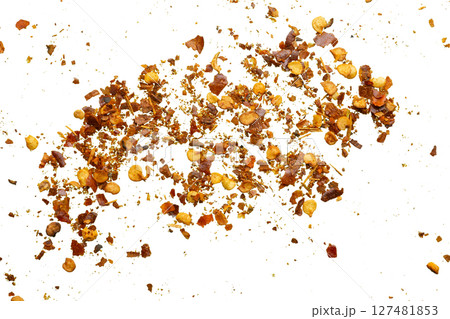 dried red chili pepper flakes and seeds isolated on white background 127481853